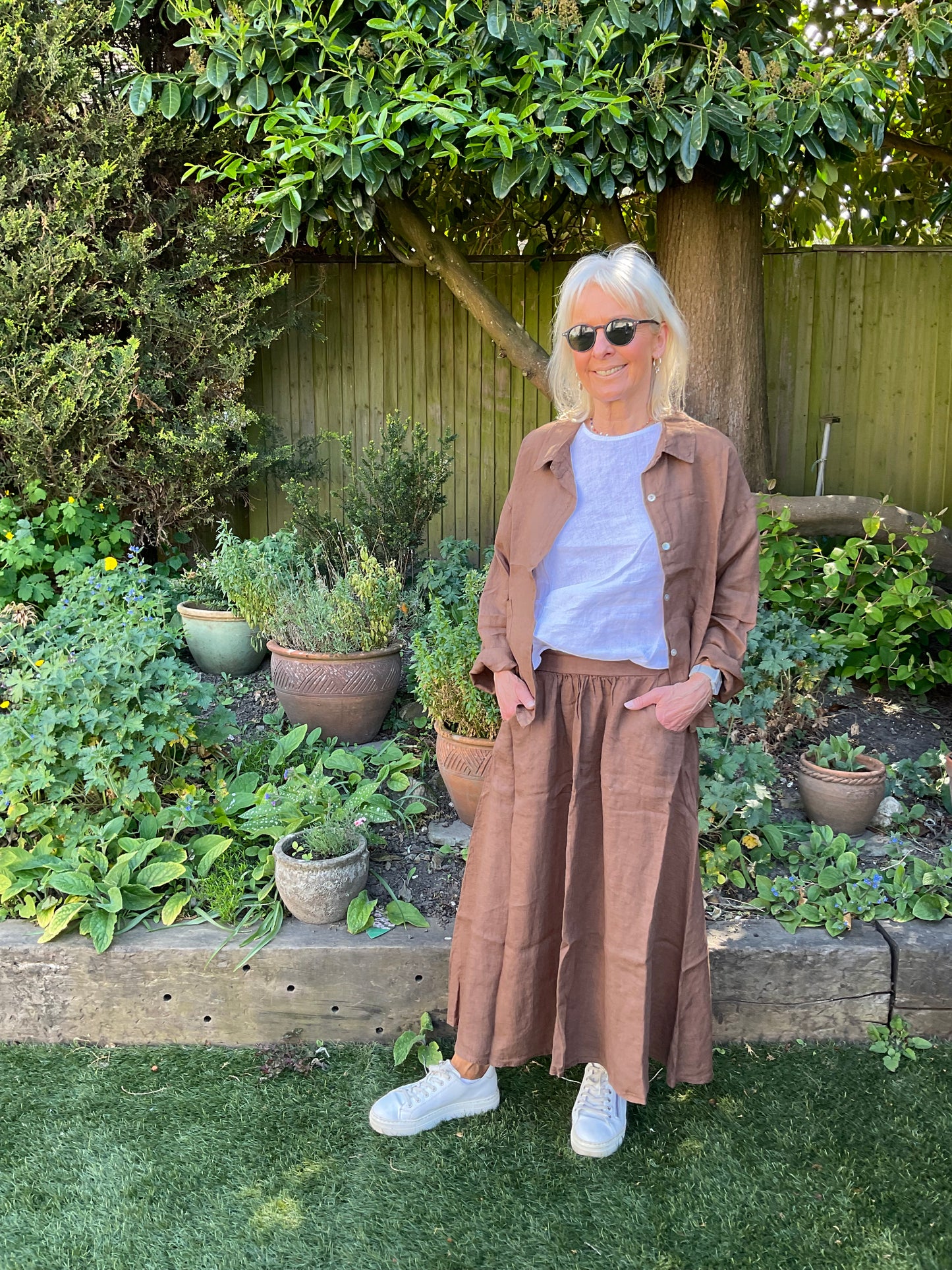 Summer styling in chocolate with white linen top