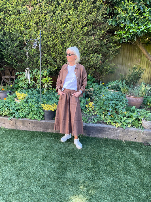 Summer styling in chocolate with white linen top