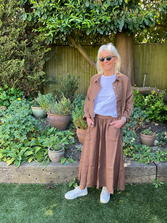 Summer styling in chocolate with white linen top