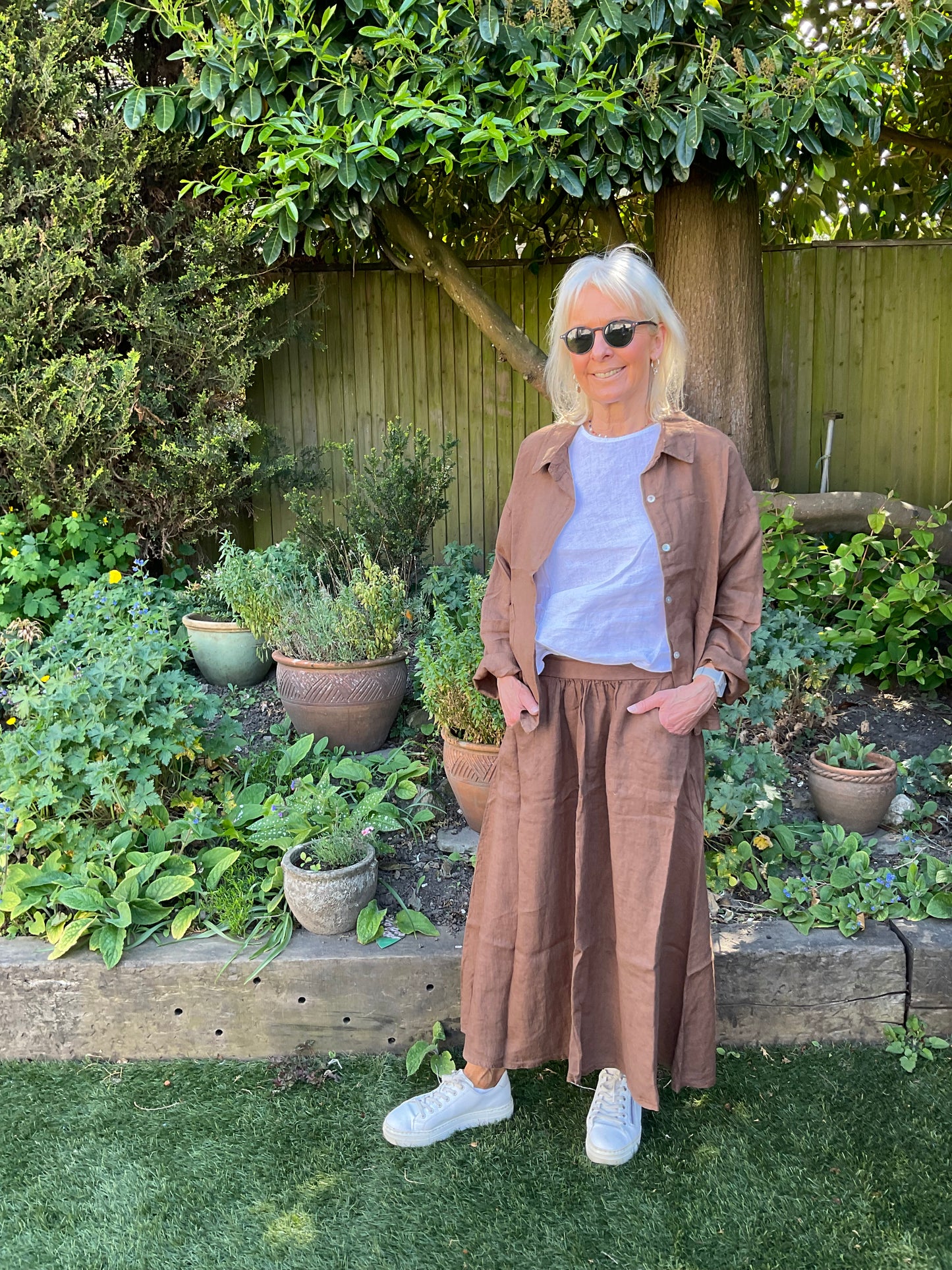 Summer styling in chocolate with white linen top